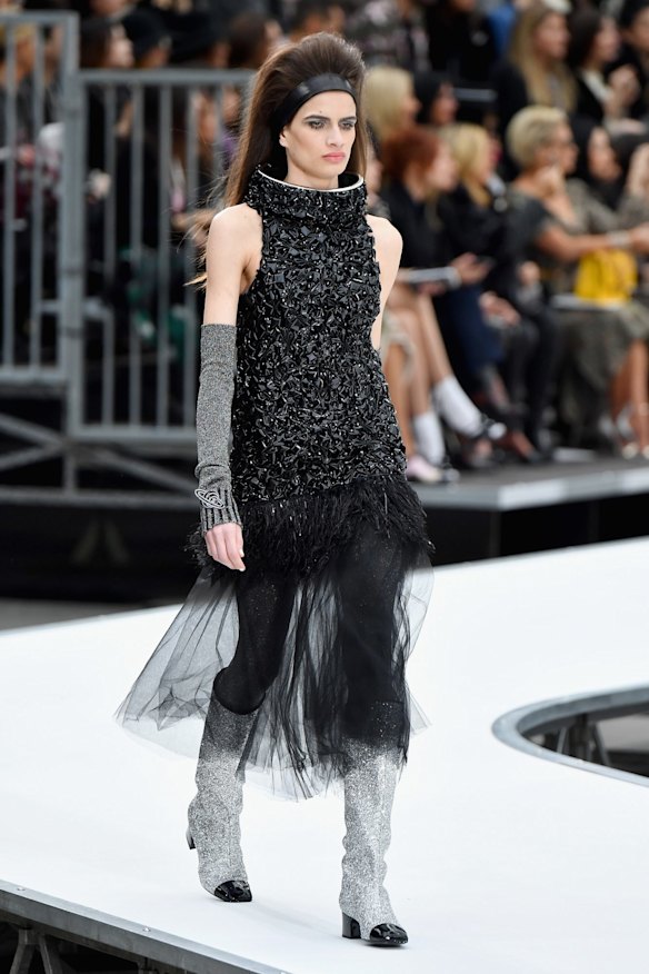 Knee-high, cap-toe boots were the Chanel shoe of the season.