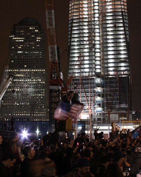 Crowds gather outside the World Trade Centre at around 2-3am in Manhattan.