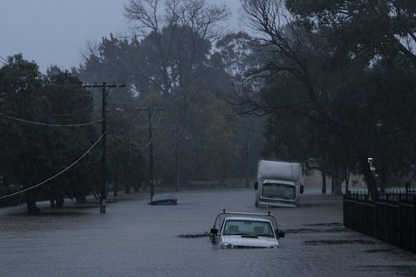 Flooding in Lansvale as waters rise along the Georges River.