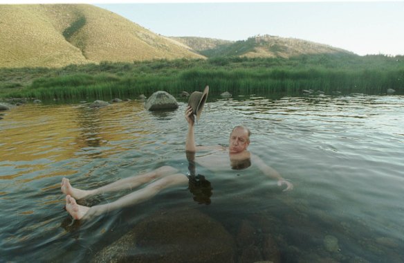 Tim Fischer relaxes in the waters of the Tumut River.