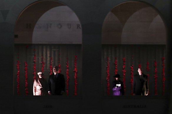 Jenny Morrison, Prime Minister Scott Morrison, Linda Hurley and Governor-General David Hurley stand along the Roll of Honour during the Anzac Day commemorative service at the Australian War Memorial in Canberra.