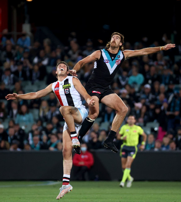 Rowan Marshall (left) takes on Scott Lycett.