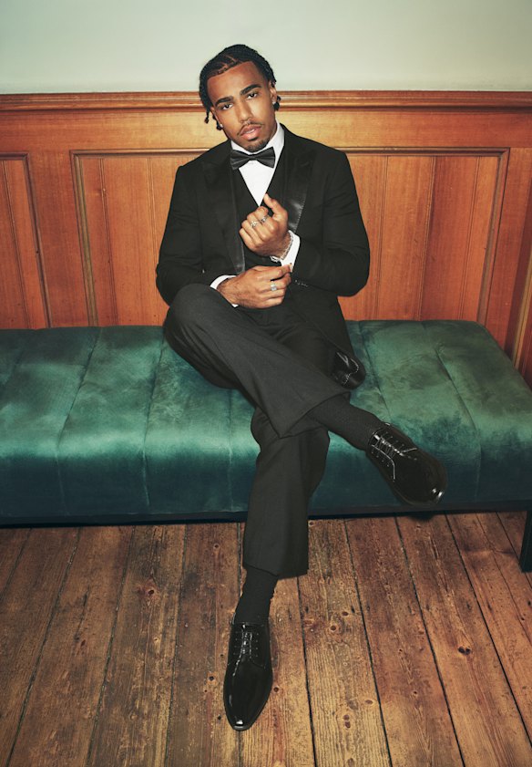Isaac Quaynor is a fan of dressing up and wearing jewellery.