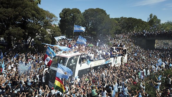 Soccer fans welcome home the Argentine soccer team after it won the World Cup tournament in Buenos Aires, Argentina.