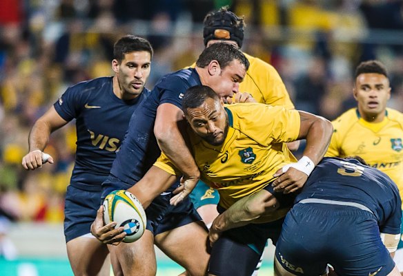Wallabies prop Sekope Kepu tries to offload during the Rugby Championship's fourth round clash between Australia and Argentina at Canberra Stadium. 