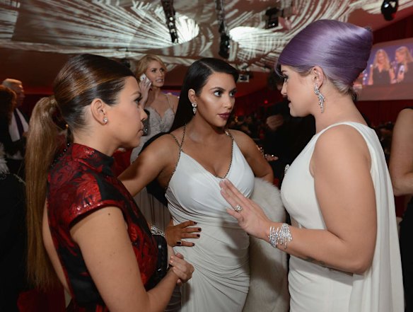 (L-R) TV Personalities Kourtney Kardashian, Kim Kardashian and Kelly Osbourne attend the 21st Annual Elton John AIDS Foundation Academy Awards Viewing Party.