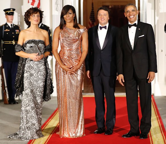 President Barack Obama and first lady Michelle Obama greet Italian Prime Minister Matteo Renzi and his wife Agnese Landini.