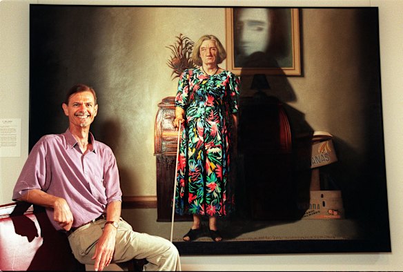 1997 Archibald Prize winner Nigel Thomson in front of his portrait of Barbara Blackman.