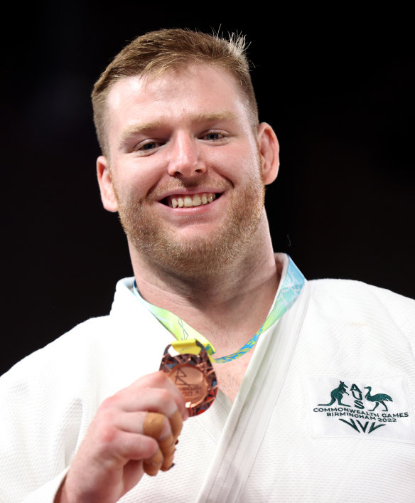 Liam Park celebrates his bronze medal win.