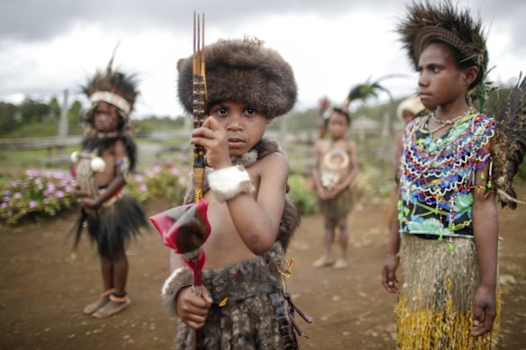 Eastern Highlands children in traditional attire in Kainantu, Papua New Guinea. 