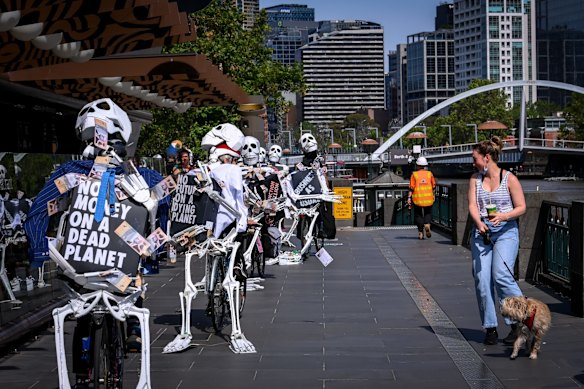 Earlier on Saturday, skeletons clutching briefcases full of money had cycled from the Melbourne CBD to St Kilda, in order to highlight the “failure” of this week’s COP26 climate summit in Glasgow, Extinction Rebellion’s spokeswoman Jane Morton said at the protests.
