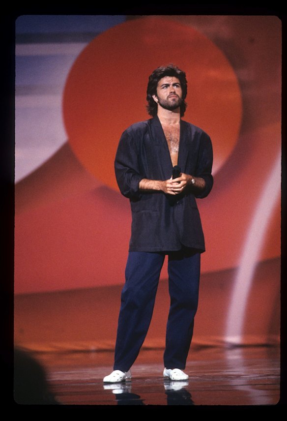 1986 saw him update his on duty look to a lounge suit sans shirt.