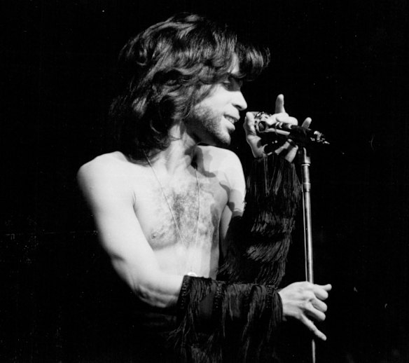 Prince performs a benefit in memory of ex-bodyguard Chick Huntsberry in Minneapolis in 1990.