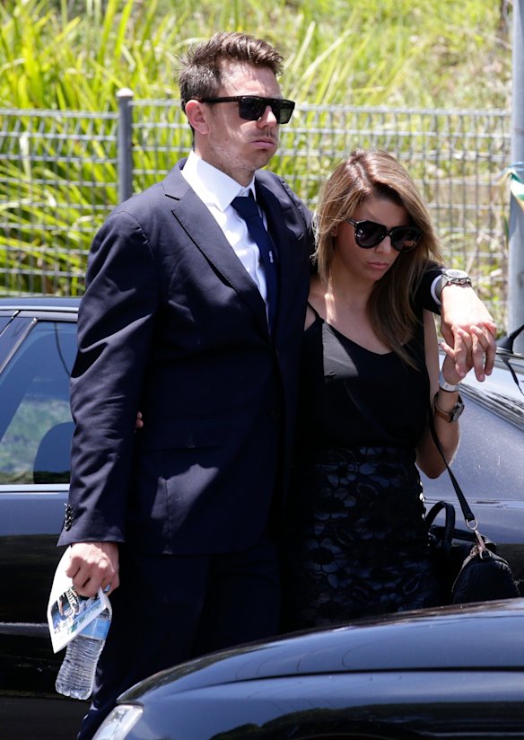 Phillip Hughes funeral at Macksville High School. James Pattinson and girlfriend. 
Photo: Edwina Pickles. 
3rd Dec 20014.