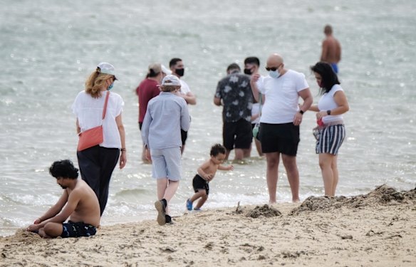 Beach goers in St Kilda
