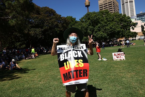 A peaceful protester at the Invasion Day rally at The Domain.