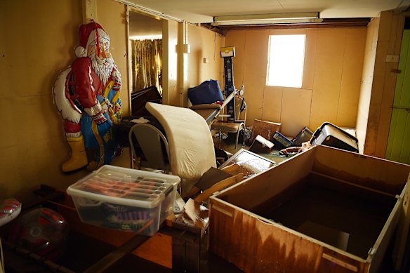 Water damaged furniture in the ground floor level of Tracey and Laurie Batshaw's house in flooded Bright street in Lismore. 