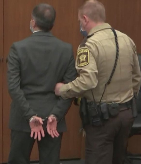 Former Minneapolis police Officer Derek Chauvin is taken into custody as his attorney, Eric Nelson, left, looks on, after the verdicts were read at Chauvin's trial for the 2020 death of George Floyd, Tuesday, April 20, 2021, at the Hennepin County Courthouse in Minneapolis
