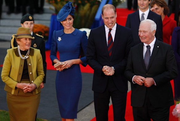 The Duke and Duchess of Cambridge, walk with Governor General of Canada David Johnston, right, and his wife Sharon, left, during their arrival at the Legislative Assembly in Victoria, British Columbia, on September 24, 2016.