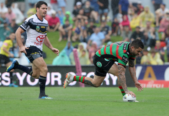 Adam Reynolds scores a try for the Rabbitohs in their win over the Cowboys.
