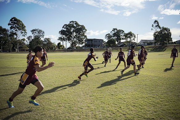 A backline move is rehearsed before the game.