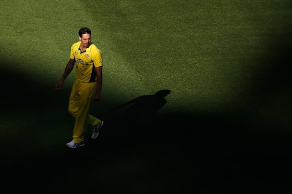MELBOURNE, AUSTRALIA - MARCH 29:  Mitchell Johnson of Australia walks back to the top of his mark during the 2015 ICC Cricket World Cup final match between Australia and New Zealand at Melbourne Cricket Ground on March 29, 2015 in Melbourne, Australia.  