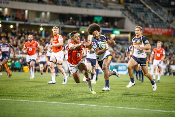 Brumbies flyer Henry Speight charges for the Sunwolves line in a man of the match performance. 
