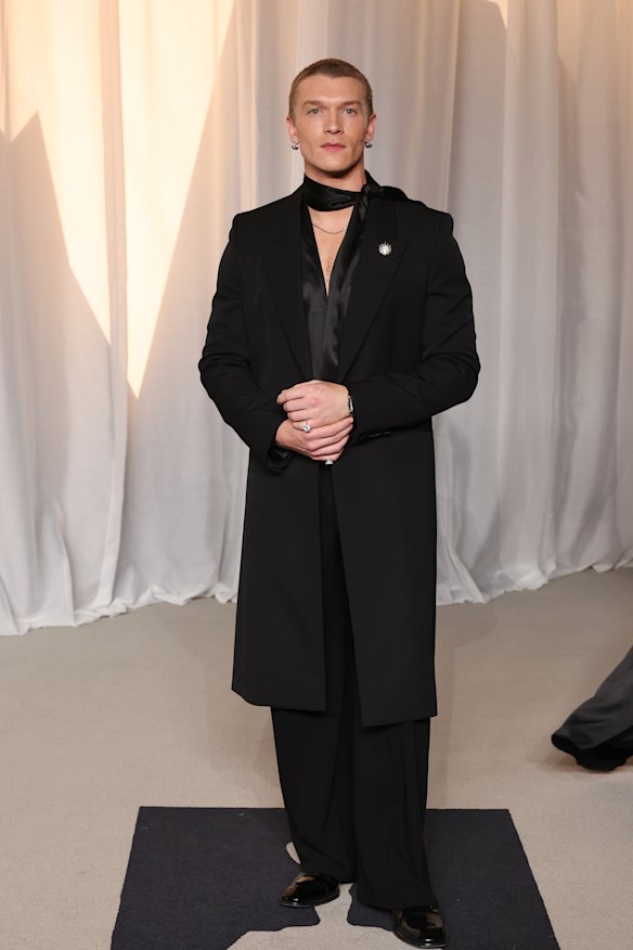 Connor Storrie could stop traffic in his Saint Laurent ensemble.