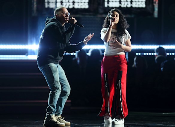 Logic and Alessia Cara perform <i>1-800-273-8255</i> at the 60th annual Grammy Awards.
