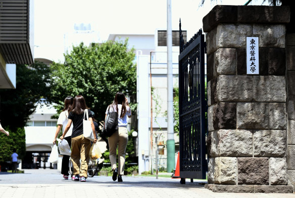 The investigation into Tokyo Medical University showed that the scores of men were raised, while those of all women, and men who had failed the test at least three times, were not.