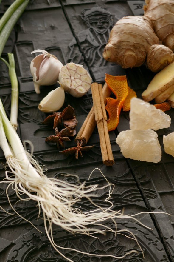 Ingredients for soy master stock – garlic, cinnamon sticks, spring onions, dried mandarin peel, ginger, star anise and yellow rock sugar.