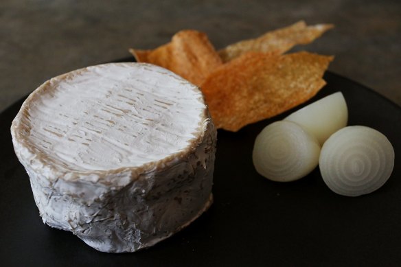 B.-d. Farm Paris Creek French Style Double Brie, $3.02 per 100g, 70/100
