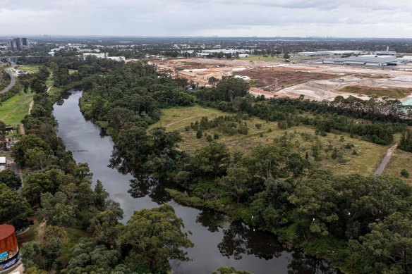 The Moorebank Intermodal project is being developed about 27 kilometres from Sydney’s CDB (seen in the distance). The former Defence land has PFAS and other toxic materials requiring long-term management.