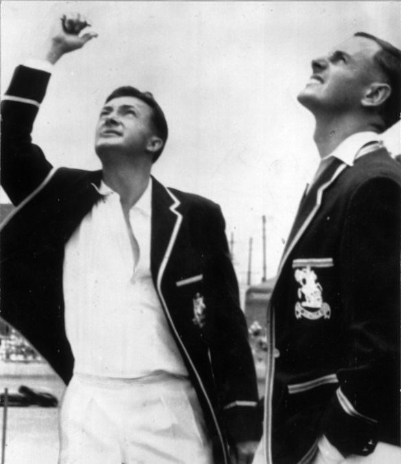 The dashing captain tosses the coin in 1958.