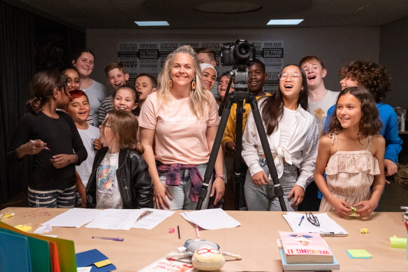 “We need to stop talking negatively about our bodies in front of our kids,” says Taryn Brumfitt, centre, with the stars of her new documentary, Embrace: Kids.