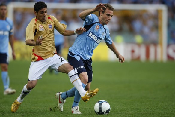 Ali Abbas tackles Sydney FC’s Adam Casey during his first spell with the Jets in 2009.