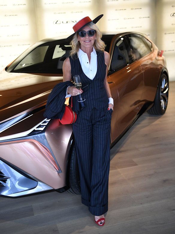 News Presenter Jo Hall wears custom Effie Kats suit at the Lexus marquee in the Birdcage on Oaks Day 2018.