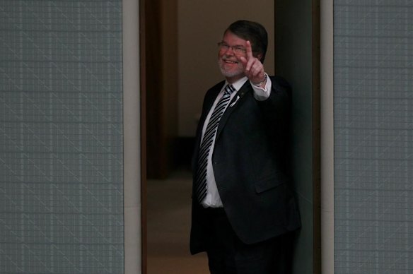 Former Speaker Harry Jenkins, enters the House of Representatives at Parliament House Canberra