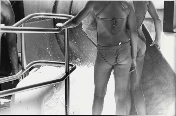 Two girls wait their turn on the slide at Manly Waterworks, December 20, 1985. 