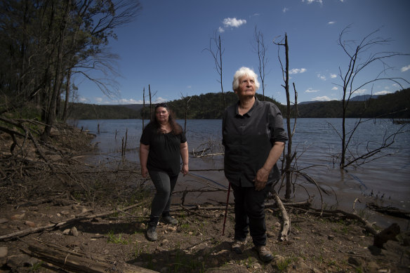 Gundungurra traditional owners, Kazan Brown (left) and Aunty Sharyn Halls, visit an area on the shores of Lake Burragorang that will be inundated if the dam wall is raised.