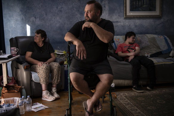 Pete King with wife Tina and son Michael at their Emu Plains home.