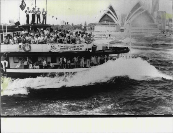 'The Karrabee' surges through the wash during the Great Ferry Race on Sydney Harbour, January 31, 1984.