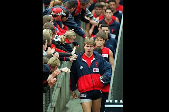Melbourne v Collingwood: Round 8:  MCG: Melbournes Jim Stynes runs on to the field for his 250th, May 17 1998.