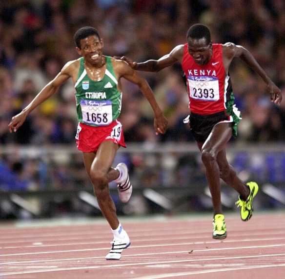 Ethiopia’s Haile Gebrselassie, left, nears a photo finish with Kenya’s Paul Tergat, at the Sydney Olympics.