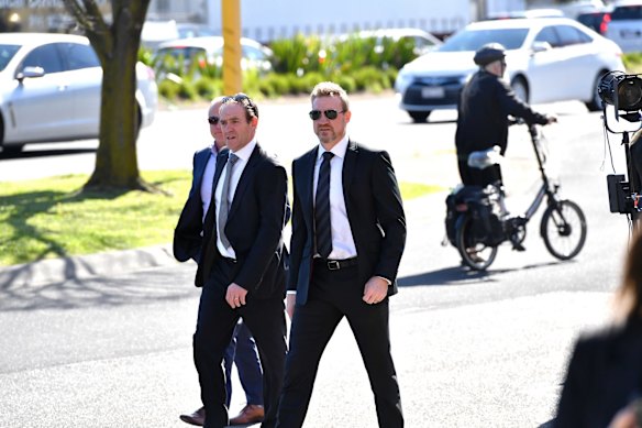 Nathan Buckley arrives at the memorial.