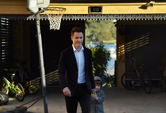 The member of Kogarah, Chris Minns with his son at their home in Sans Souci on the morning he resigns from the NSW Labor frontbench.