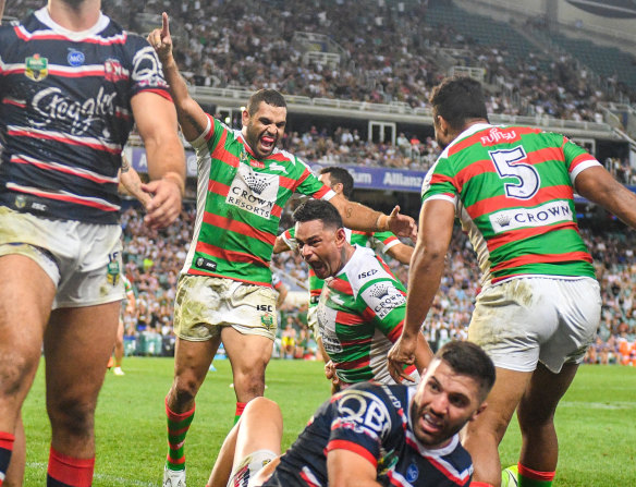 Try time: Greg Inglis, left, celebrates after John Sutton's important second half try.
