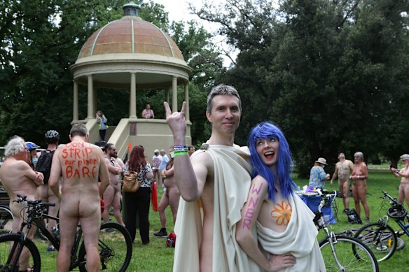 Naked cyclists Jared Bialkowski and Hanna Zysnarska.