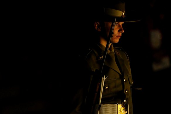 A member of the catafalque party stands at attention during the ANZAC Day dawn service at the Australian War Memorial in Canberra.
