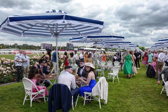Racegoers on Stakes Day at  Flemington.